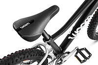 Woom hat Probleme beim Reshoring. Schwarzes Kindervelo von Woom. 