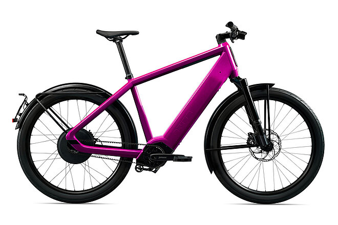 Opium Speedpedelec. E-Bike mit einem Rahmen in pinker Farbe.