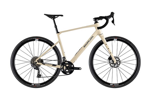Gravelbike in beiger Farbe und mit Aufschrift Simplon.