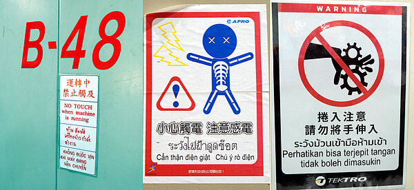 Warnschilder in verschiedenen Sprachen. 