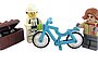 Lego Figuren mit Fahrrad.