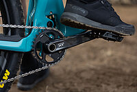 Bild, das einen Fusss auf einem Fahrradpedal zeigt.