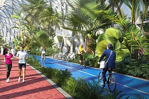 The Loop in Dubai. Fahrradweg mit grünen Planzen am Rand.