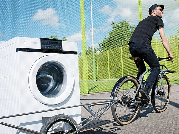 Auch Waschmaschinen können mit dem Velo transportiert werden.