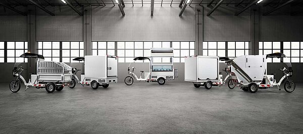 Renault Trucks steigt bei Kleuster ein. XL-Cargobikes stehen in einer Lagerhalle. 