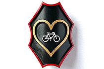 Veloemblem velo ind goldenem Herz aus dem 3D-Drucker