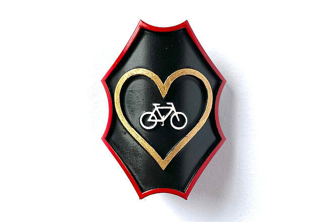 Veloemblem velo ind goldenem Herz aus dem 3D-Drucker