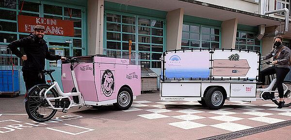 Basel Stadt Wirtschaft unter Strom Subventionen für Cargobikes. Hotodog-Cargobike.
