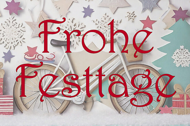 Frohe Festtage Weihnachtskarte mit Papiercollagen Velo und Scherenschnitt Sternen.
